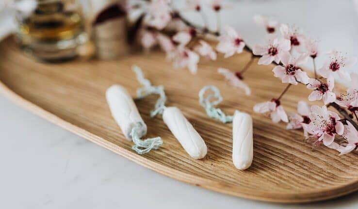 How does ibuprofen reduce period pain?
